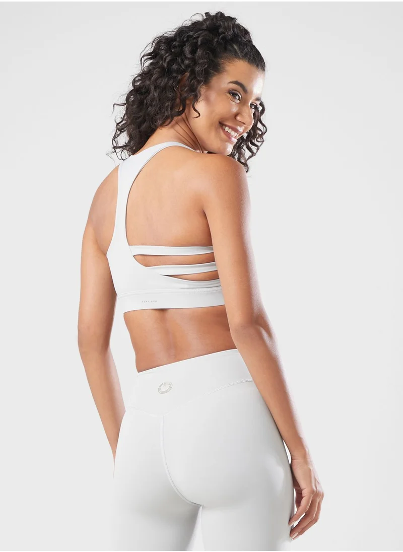 كون.يوغا Striped Back Sports Bra