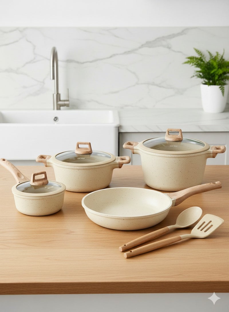 توب شيف طقم أدوات طهي وقدور ومقالي مطلية بالجرانيت بأسطح مانعة للالتصاق ومقابض خشبية وأغطية من الزجاج مزودة بالسيليكون المقوى وخالية من حمض بيرفلورو الأوكتانويك مكون من 9 قطع - لون بيج - Image 4