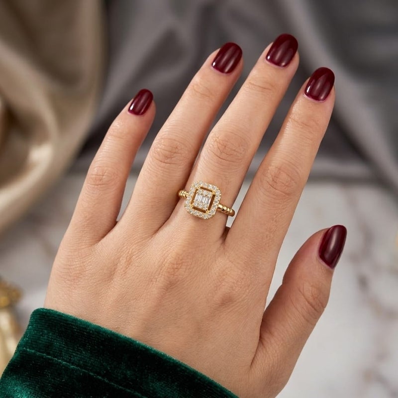 An elegant open gold ring with a square design that combines sparkling cubic zirconia stones with a delicate halo of smaller stones. Its open band makes it adjustable to fit all sizes. - Image 2