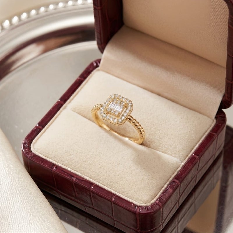 An elegant open gold ring with a square design that combines sparkling cubic zirconia stones with a delicate halo of smaller stones. Its open band makes it adjustable to fit all sizes. - Image 5