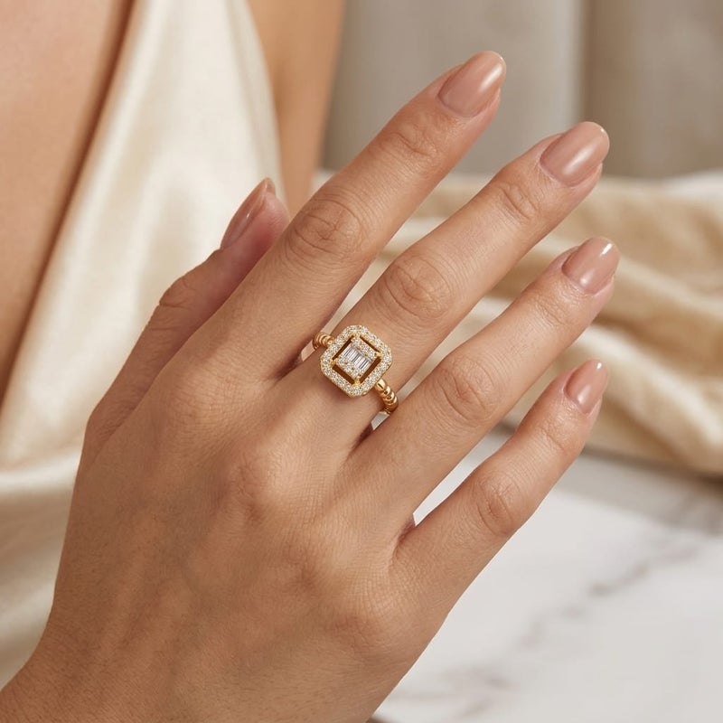 An elegant open gold ring with a square design that combines sparkling cubic zirconia stones with a delicate halo of smaller stones. Its open band makes it adjustable to fit all sizes. - Image 3