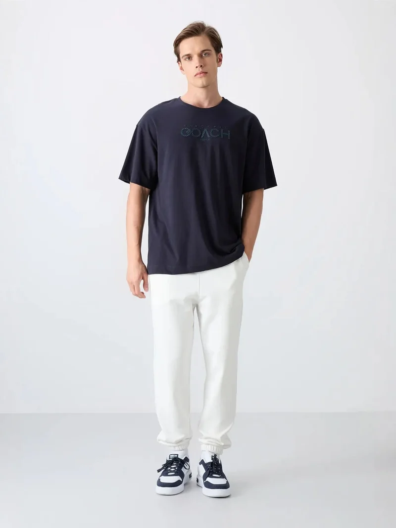 TOMMYLIFE TOMMY Oversized Logo Patch Crew Neck T-Shirt