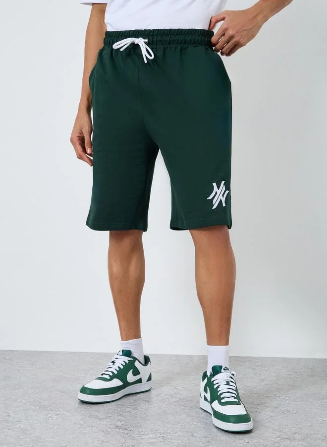 Styli  Men Minimal Print Oversized T-Shirt and Shorts Co-Ords for Men | Best Price UAE