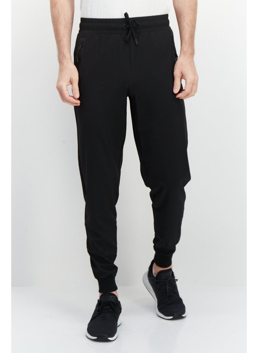 Men Sportswear Fit Plain Outdoor Sweatpants, Black - pzsku/ZBB4EB2784A304B1CB095Z/45/_/1726109244/0a35da6e-9e6c-4dde-b606-7f21246e16f6