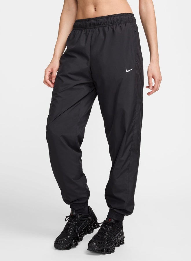 Nike Women’S Nike Sportswear Out-Of-Game Uv Essential Woven Major Joggers - Image 1