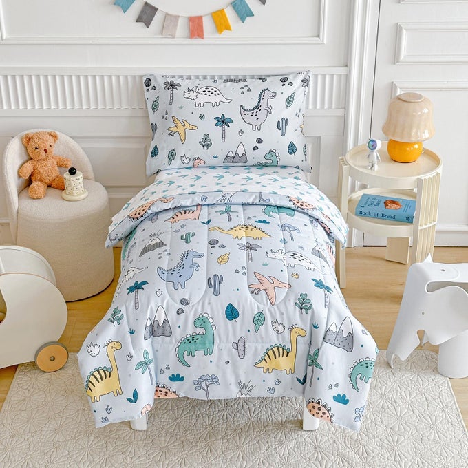 4 PIECE TODDLER BEDDING SET CUTE DINOSAUR ON LIGHT BLUE ULTRA SOFT MICROFIBER TODDLER COMFORTER FOR KIDS BOYS GIRLS INCLUDES QUILTED COMFORTER FITTED SHEET TOP SHEET AND PILLOW CASE