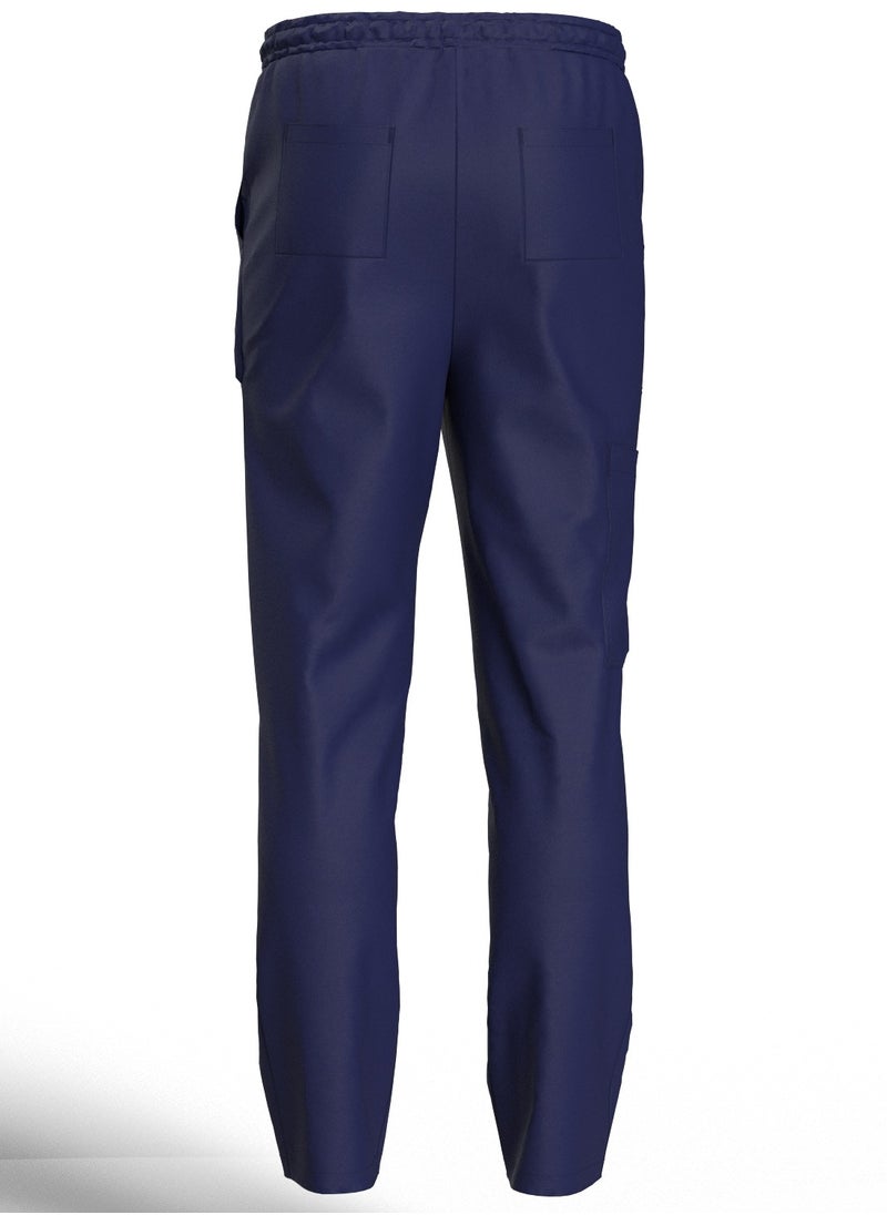 Doctor - Scrub Comfortable Navy Blue Lycra fabric with many pockets is meticulously crafted to retain its color without fading with repeated washing - Image 1
