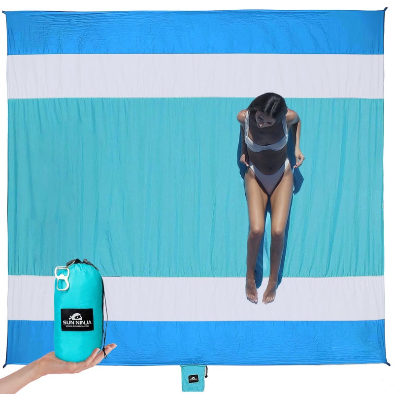 SUN NINJA Sand Proof Beach Blanket - Sand Free Beach Mat, Lightweight & Quick Dry Beach Essentials with Travel Bag, Giant Beach Blanket (10'x9') Perfect for Outdoors, Picnic, Camping & Travel - Image 1