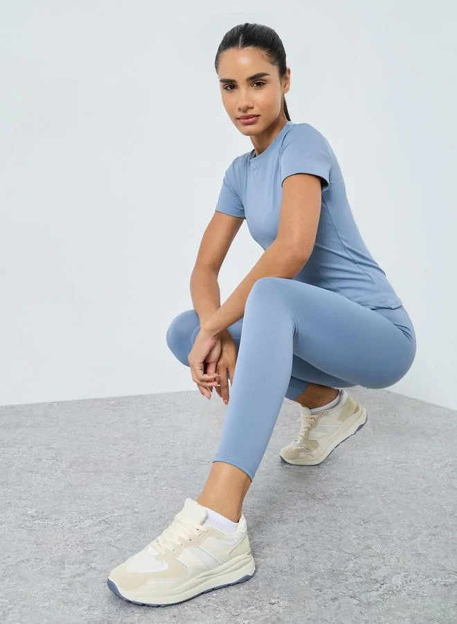 Styli Active Stitch Detail Short Sleeves Top and Leggings Set