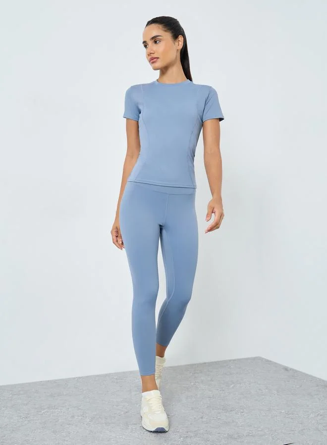 Styli Active Stitch Detail Short Sleeves Top and Leggings Set