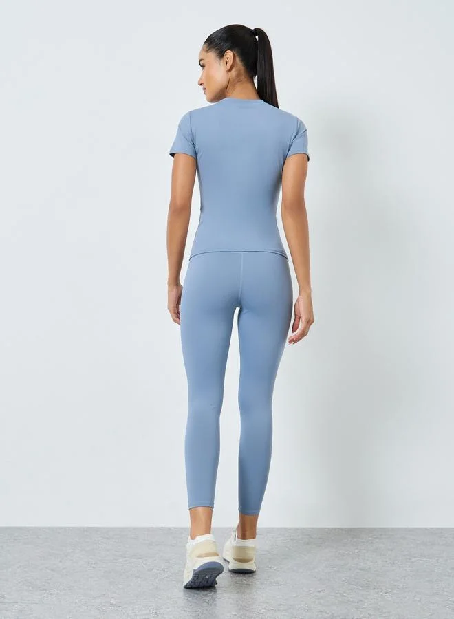 Styli Active Stitch Detail Short Sleeves Top and Leggings Set