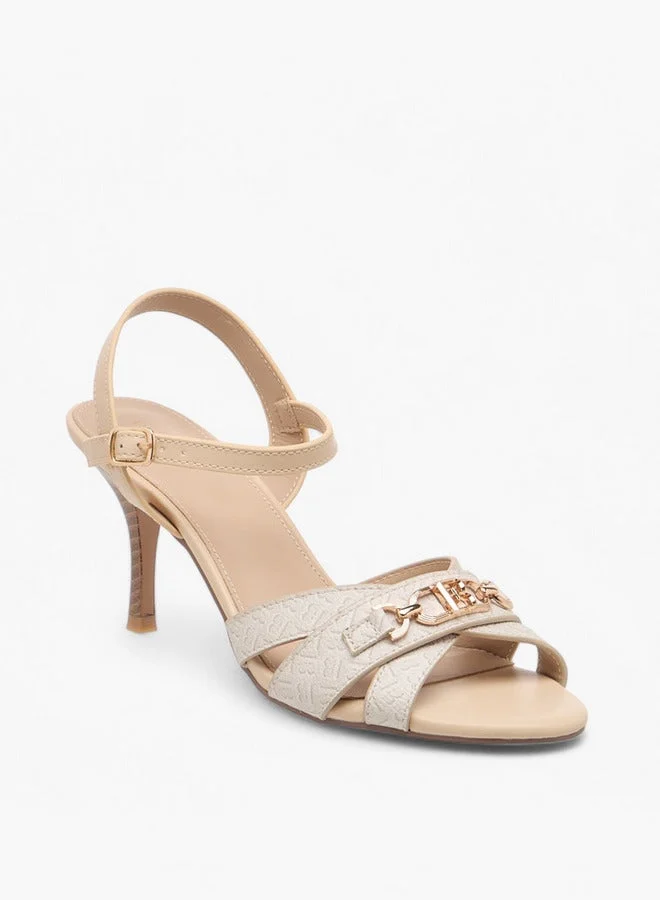 فلورا بيلا من شو إكسبرس صنادل بطبعة المونوغرام بكعب ستيليتو وإغلاق بإبزيم