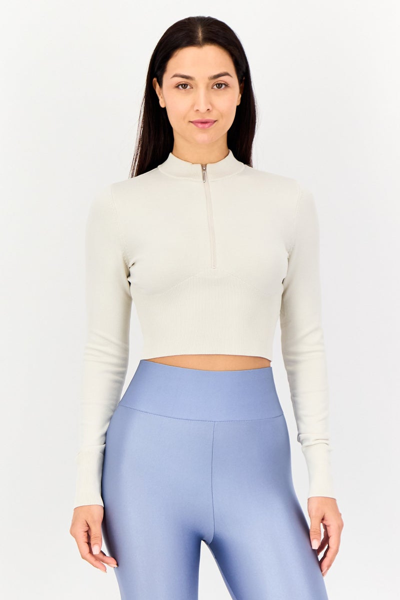 Nike بلوزة نسائية ضيقة بأكمام طويلة خارجية، كريمي - Image 1