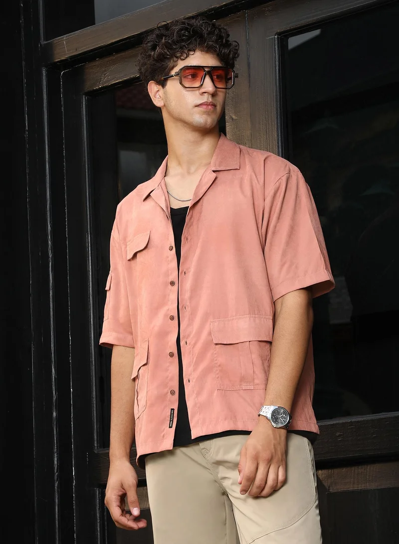 Campus Sutra Campus Sutra Men's Nude Pink Modular-Utility Cuban Oversized Shirt | Cuban Collar , Short Regular Sleeves , Button Closure , Straight Hem | Solid Plain | Polyester Shirt For Casual Wear