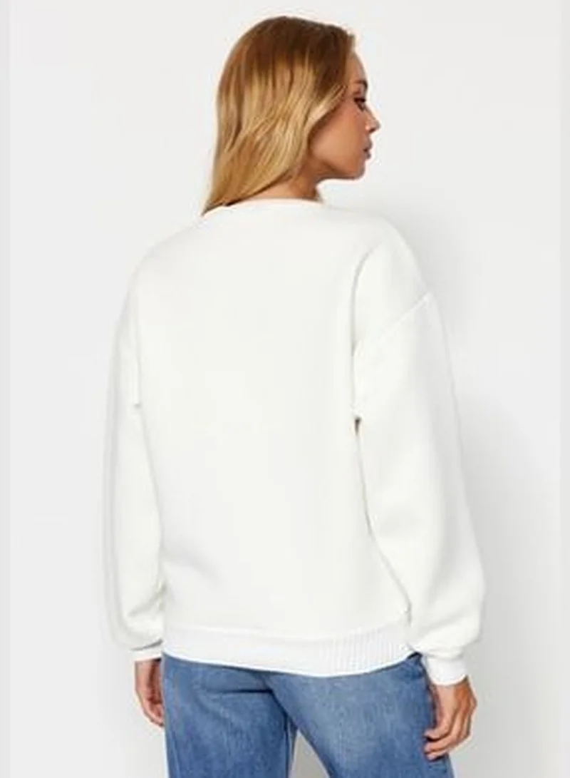 trendyol Ecru Regular/Regular fit Sweater Detailed Printed Fleece Fleece Knitted Sweatshirt TWOAW24SW00051.
