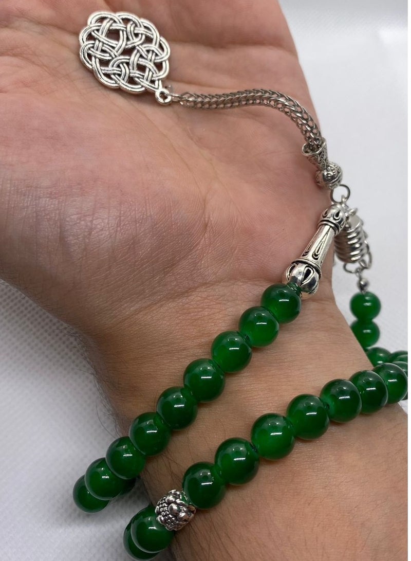 A multi-use agate rosary that can be worn as a wonderful and distinctive bracelet made of onyx stone that combines beauty and spirituality, making it a favorite choice for many for the purposes of remembrance and meditation. We provide it in wonderful colors that suit men and women and consists of 33 beads - Image 4