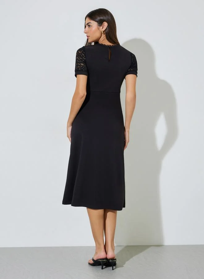 Styli  Black Solid Lace Short Sleeves A-Line Midi Dress for Women | Best Price UAE