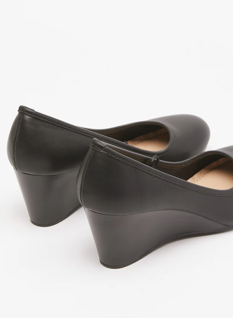 Le Confort Solid Slip On Pumps with Wedge Heels