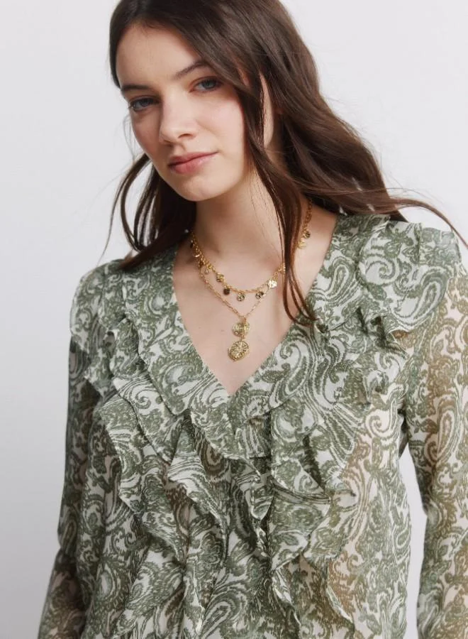 Springfield  Green printed voluminous V-neck chiffon ruffle blouse with ruffle cuffs for Women | Best Price UAE