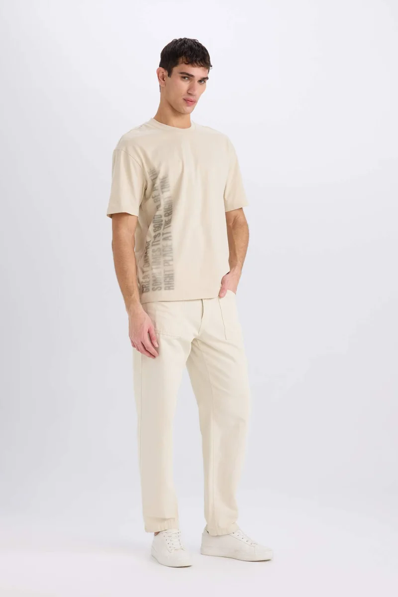 ديفاكتو Boxy Fit Crew Neck Printed Short Sleeve T-Shirt