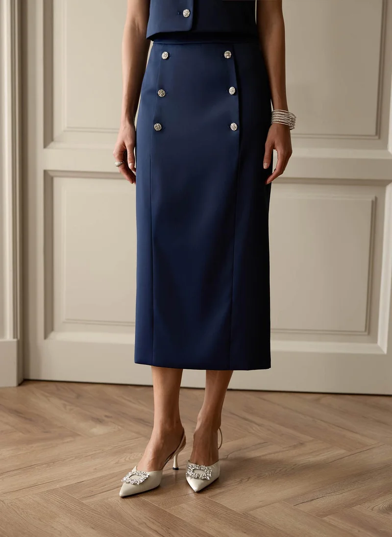 ليتشي تنورة ميدي مستقيمة مع أزرار من أحجار الراين