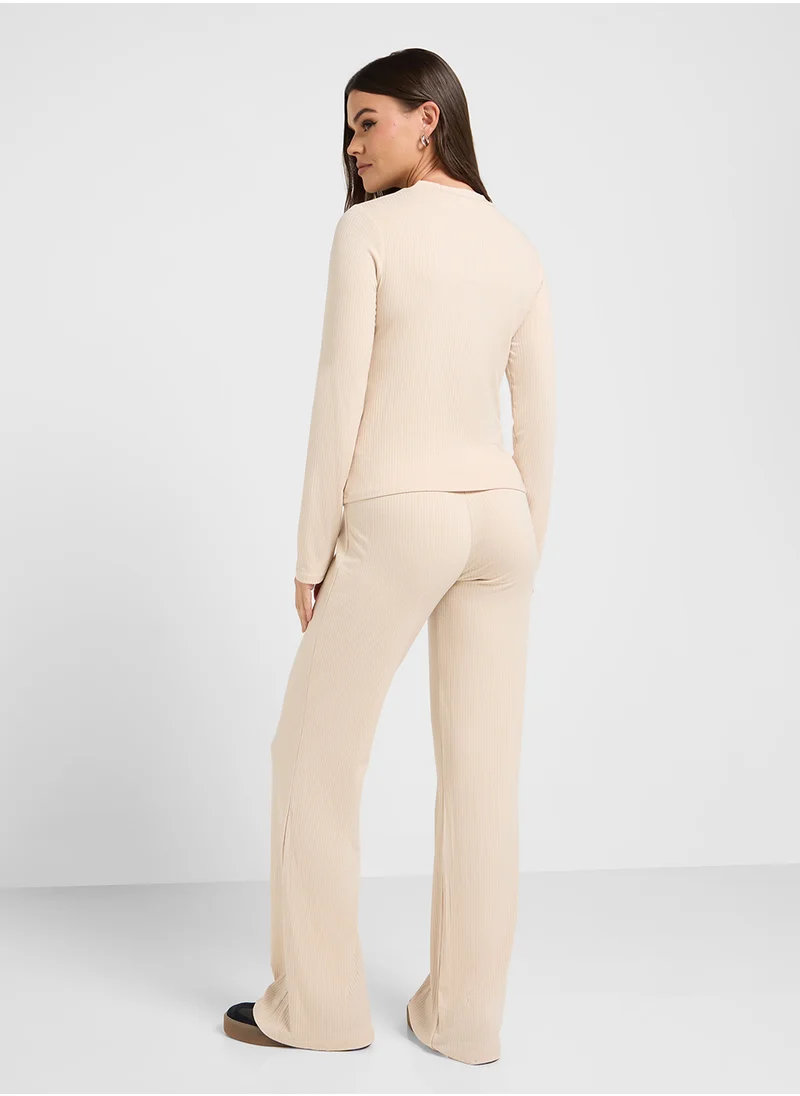 جينجر Ribbed Jersey Fitted Top & Flared Pant Set