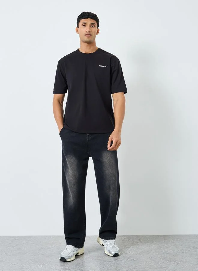 Styli Men Black Oversized Graphic Print T-Shirt