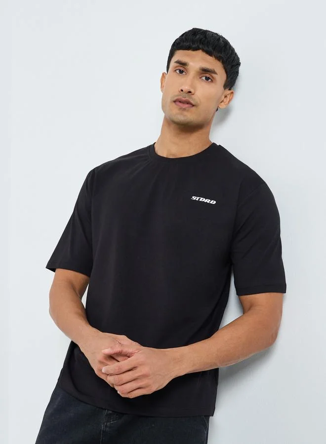 Styli Men Black Oversized Graphic Print T-Shirt