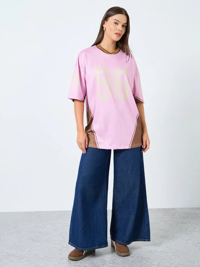 Styli Styli Pink Mesh Varsity Graphic Oversized T-Shirt