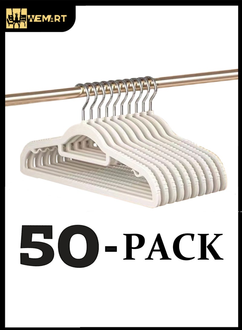 ويمارت مجموعة من 50 قطعة من شماعات الملابس المطاطية غير القابلة للانزلاق، شماعات مطاطية غير قابلة للانزلاق، شماعات معاطف شديدة التحمل، شماعات بدلات رفيعة فاخرة موفرة للمساحة لمنظمات خزانة الملابس، خطافات فضية تدور 360 درجة - Image 1
