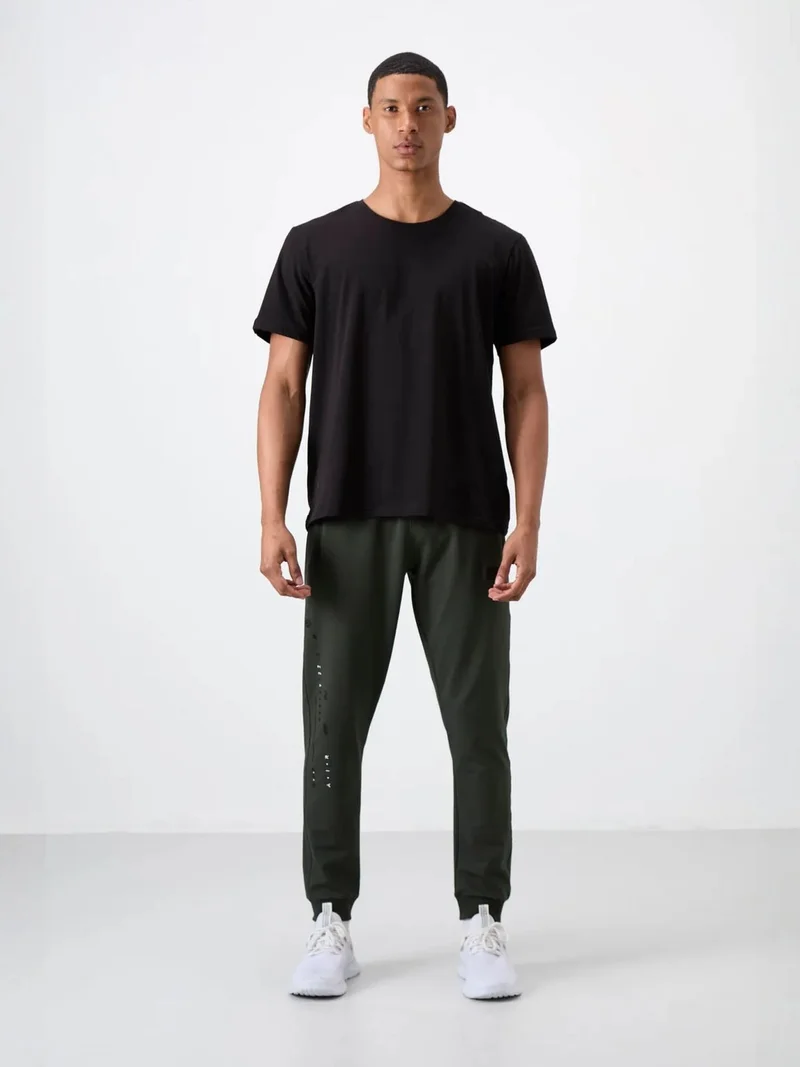 تومي لايف TOMMY Men's Solid Jogger Sweatpants