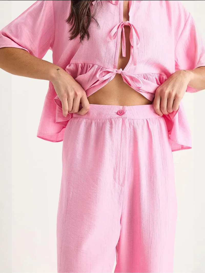 بيانكو لوتشي طقم لوكسي قطعتين بنقوش مع تفاصيل كشكش