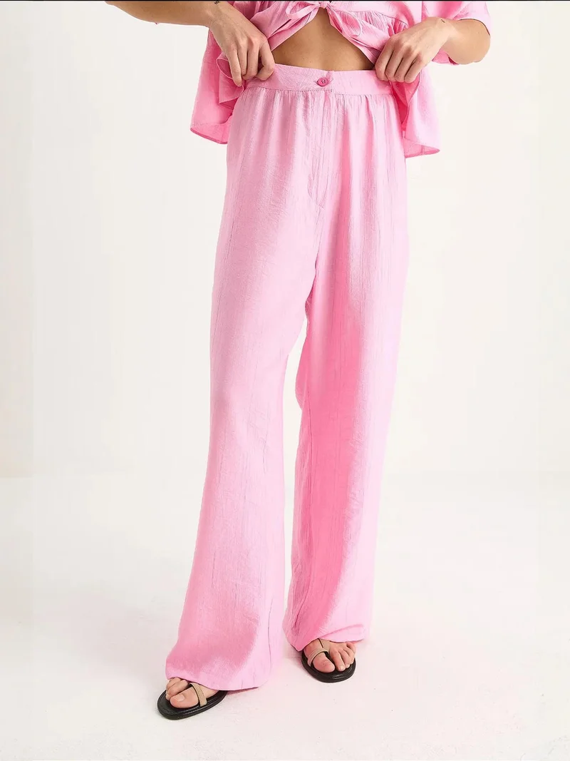 بيانكو لوتشي طقم لوكسي قطعتين بنقوش مع تفاصيل كشكش