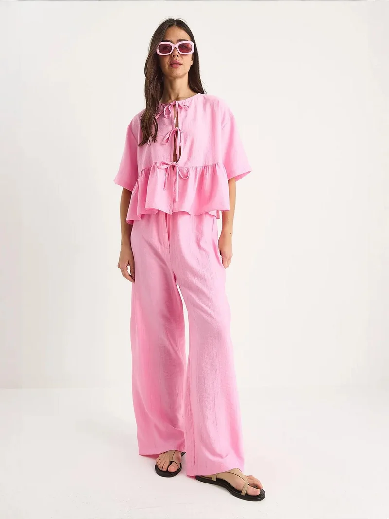 بيانكو لوتشي طقم لوكسي قطعتين بنقوش مع تفاصيل كشكش