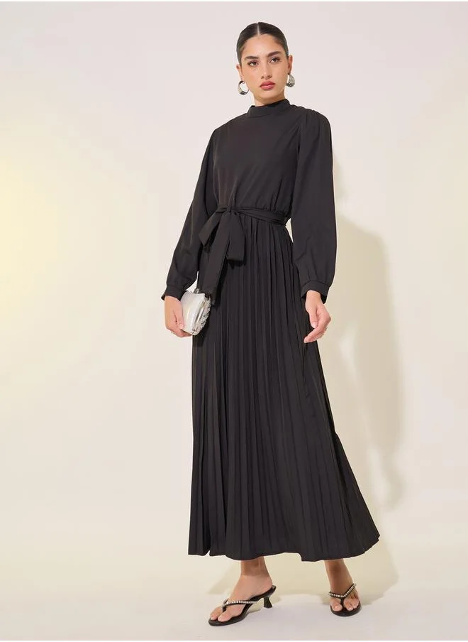 Styli Solid High Neck Long Sleeve Pleated Waist Tie Maxi Dress