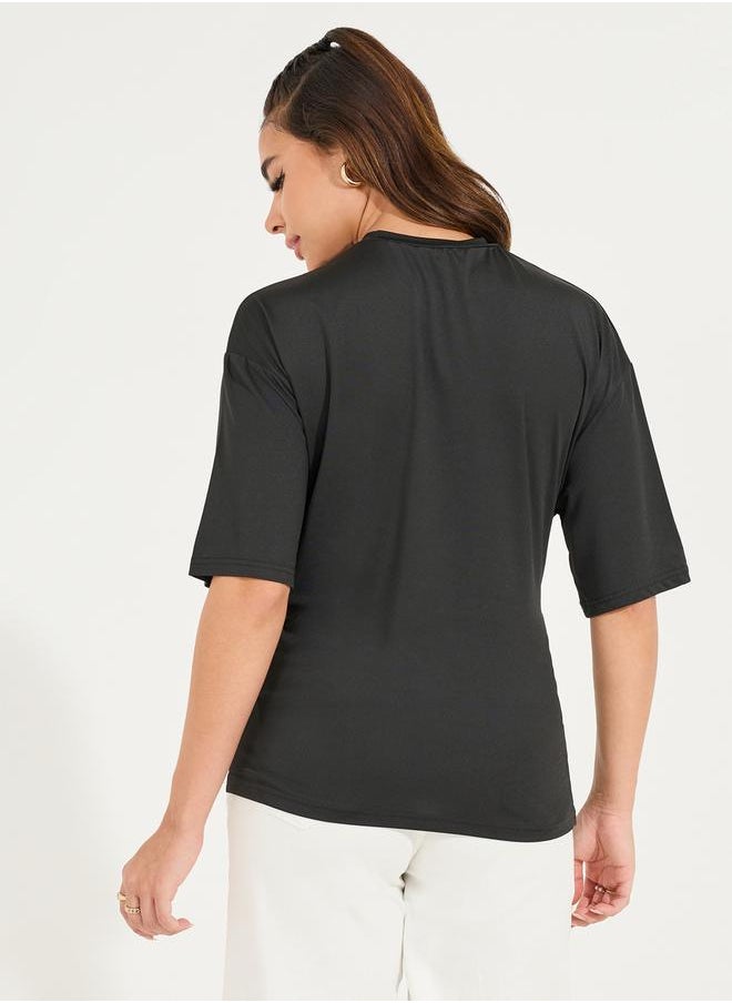 Oversized Round Neck Side Tie-Up Detail T-Shirt - pzsku/ZBBFC493F09AE26A38E9EZ/45/1741263421/eeef020f-a380-48c2-9b5d-aa405bee23e2