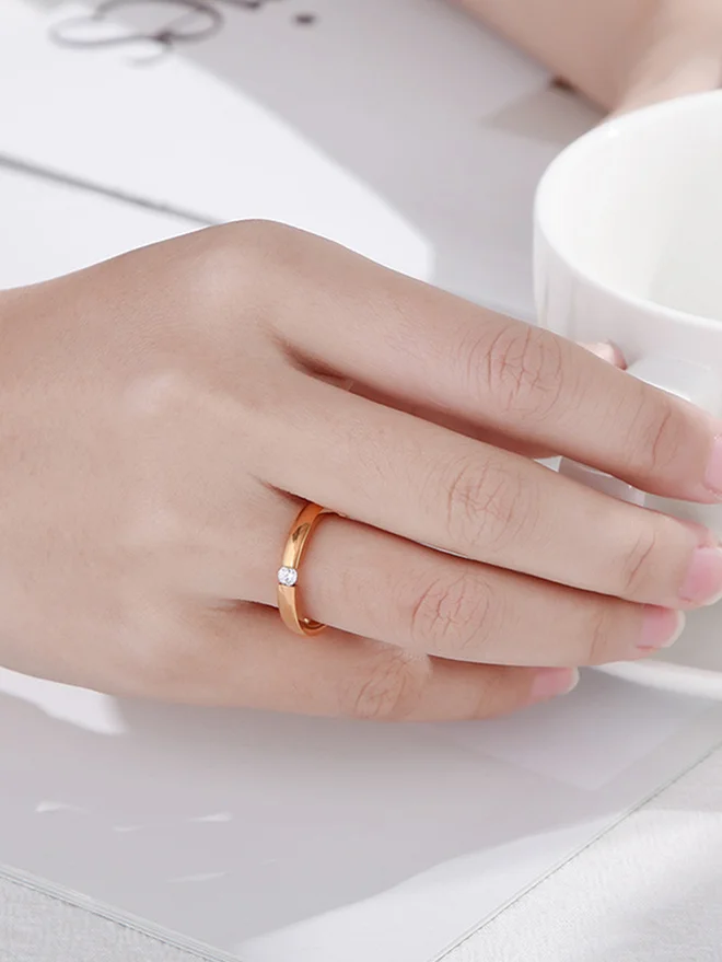 Styli Rose Gold Ring with Delicate Diamond Accent