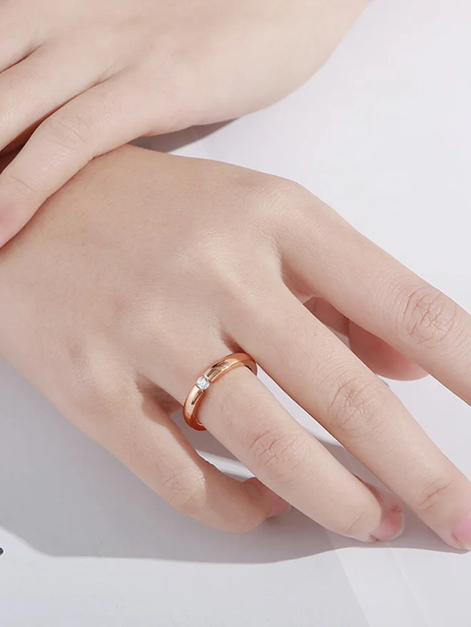 Styli Rose Gold Ring with Delicate Diamond Accent