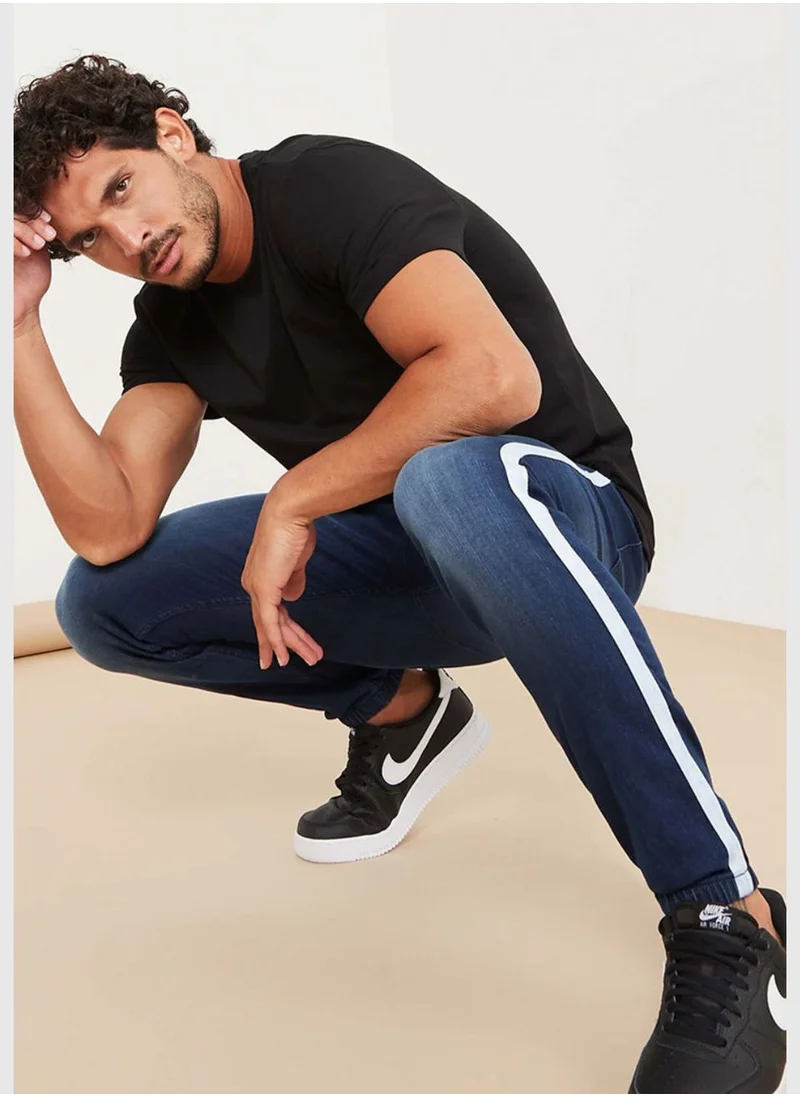 Campus Sutra Jeans with Side Stripes