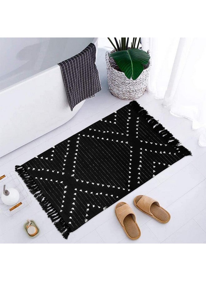 LIVEBOX Boho Bathroom Rug 2' x 3' Washable Black Rug Small Moroccan Throw Rug for Bath,Cotton Woven Area Rug Carpet with Tassel for Entryway Kitchen Sink Front Door - Image 1