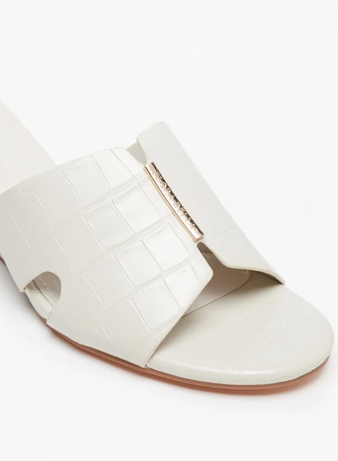 فلورا بيلا من شو إكسبرس Women's Textured Slip-On Sandals With Wedge Heels