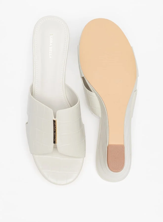 فلورا بيلا من شو إكسبرس Women's Textured Slip-On Sandals With Wedge Heels