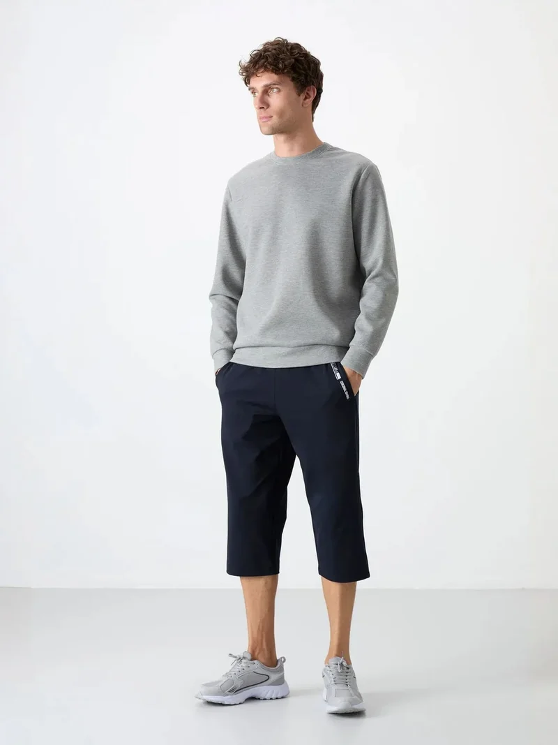 تومي لايف TOMMY Men's Mid-Waist Capri Shorts