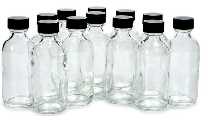 12 CLEAR 2 OZ GLASS BOTTLES WITH LIDS