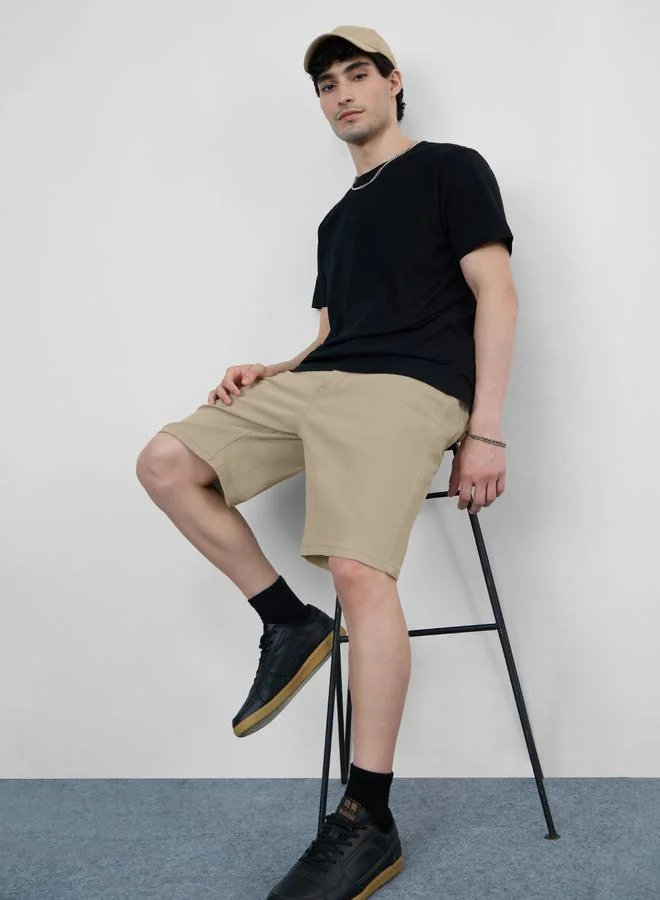 ذا سوليد ستور شورت دنيم سادة بطول الركبة