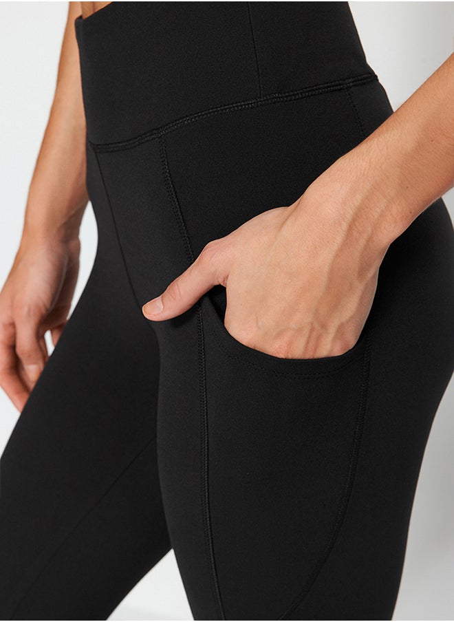 trendyol - Black Reflective Print and Pocket Detailed Flare Leg Yoga Knitted Sports Tights THMAW24TY00066 - Image 1