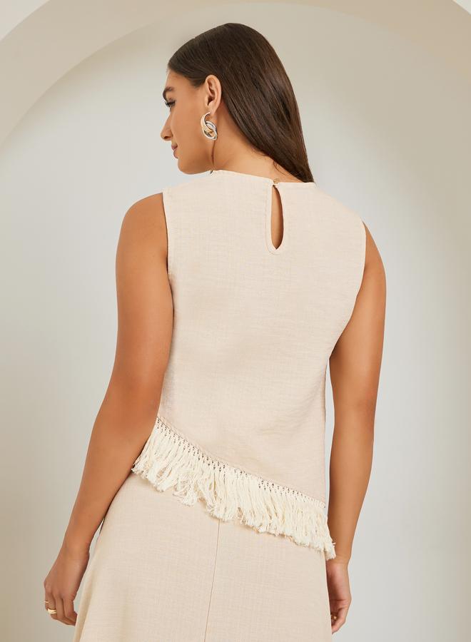 ستايلي بلوزة بلا أكمام وتفاصيل شراشيب - Image 4