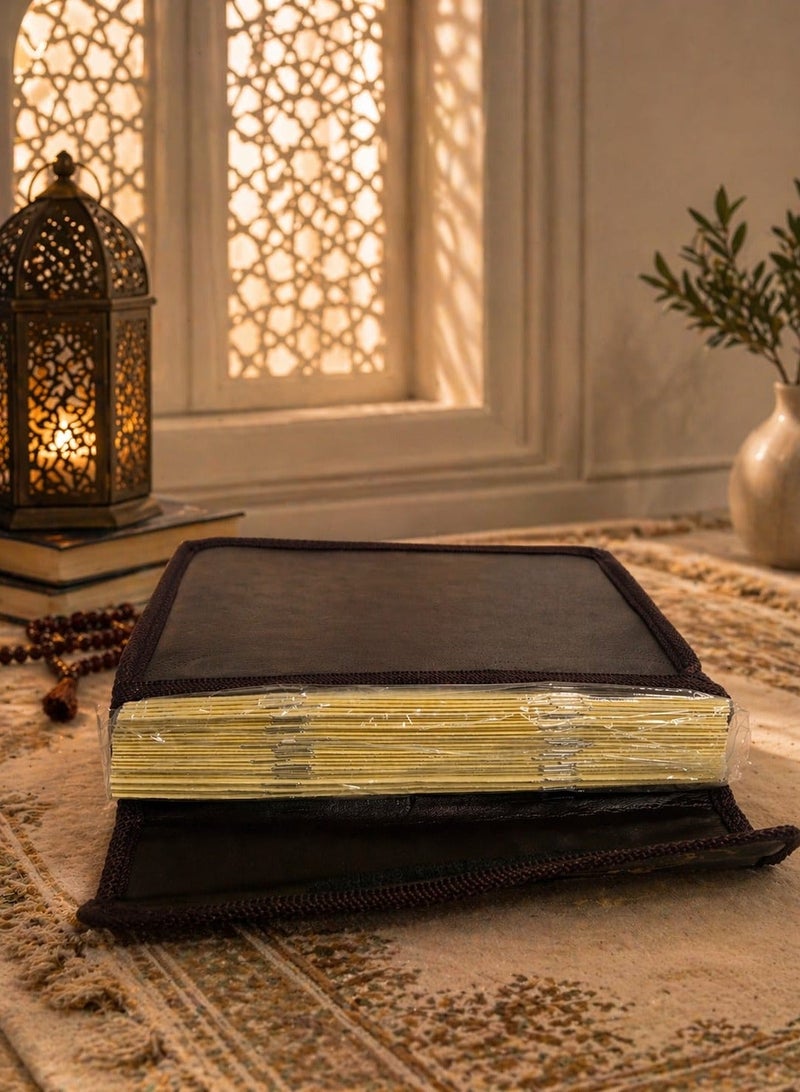 A small-sized Quran divided into 30 parts, with a carrying case. - Image 2