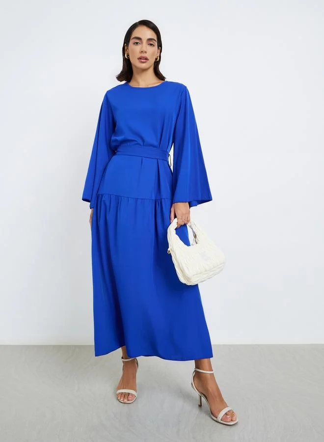 ستايلي فستان طويل قصة واسعة بحزام ربط