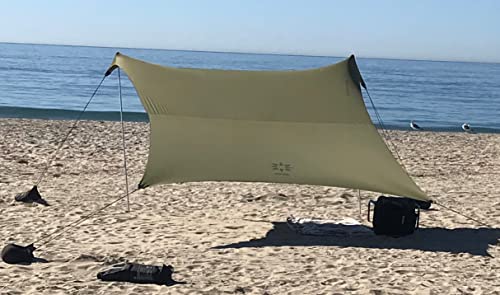 Neso Portable Beach Tent Sun Shelter with Sand Anchor - Lightweight Beach Shade Canopy - Easy Setup for Family Outings - Patented Reinforced Corners - UPF 50+ Sun Protection - 7 x 7ft - Army Green - Image 1